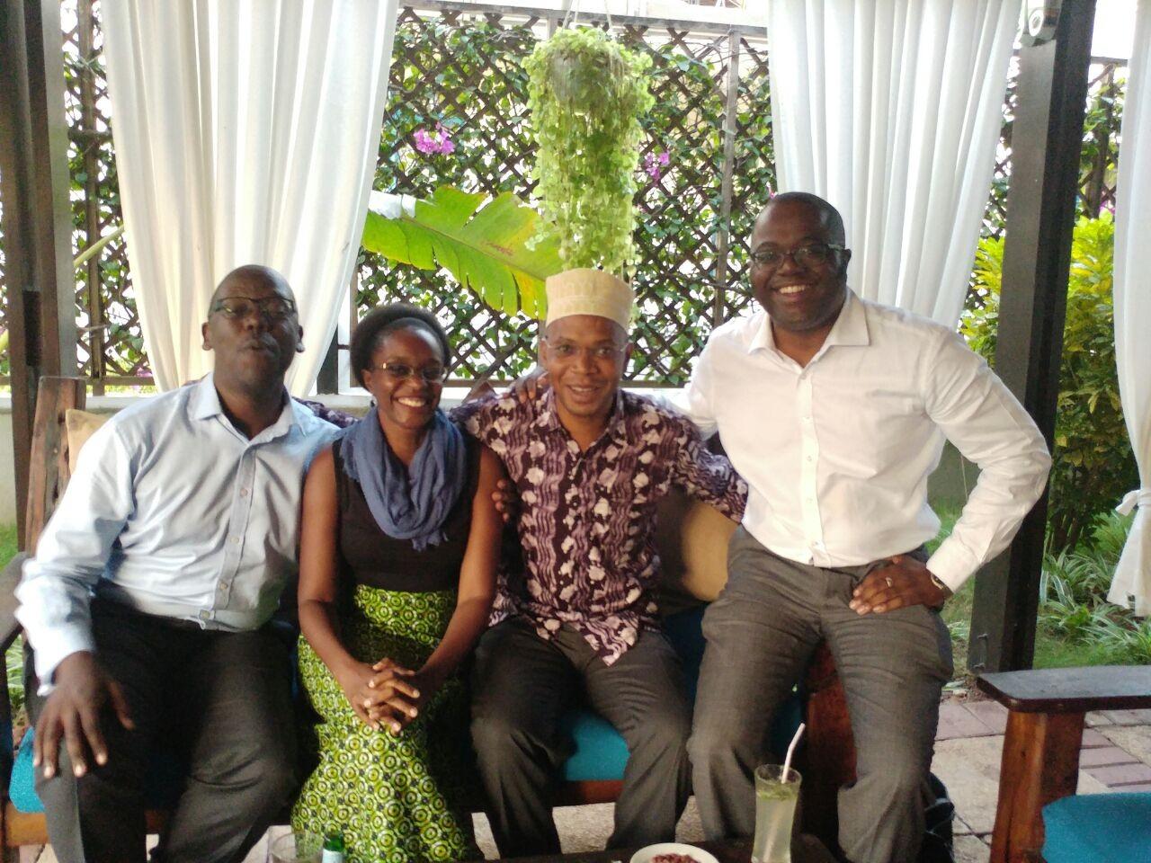 Aidan Eyakuze, Neema Ndunguru, January Makamba, and Charles Washoma meeting in Dar es Salaam
